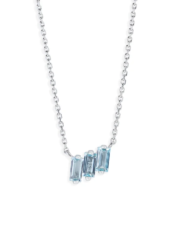 Trendy pendant necklaces with feather or leaf motifs for a nature-inspired look -Three Baguette Blue Topaz White Gold Necklace