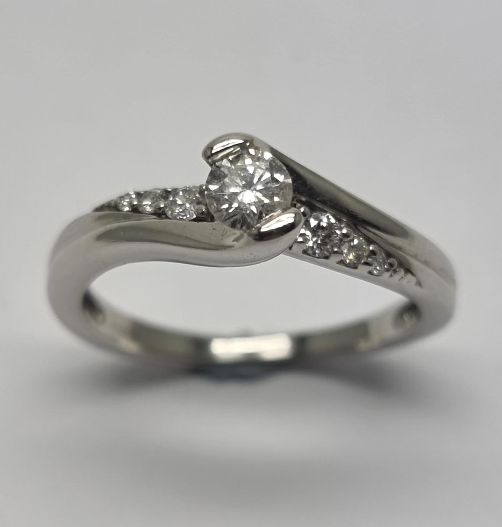 Rings inspired by rivers with flowing designs -9ct White Gold 0.22ct Diamond Solitaire Ring - Size N - RRP £895