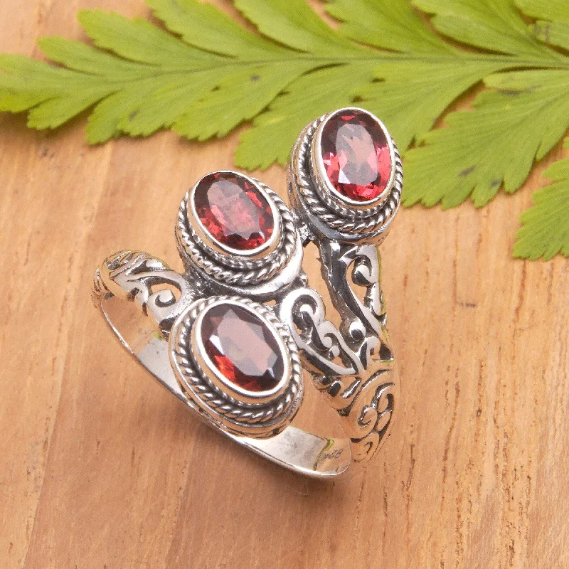 Rings featuring stretch bands for easy sizing -Novica Handmade Flaming Roots Garnet Cocktail Ring