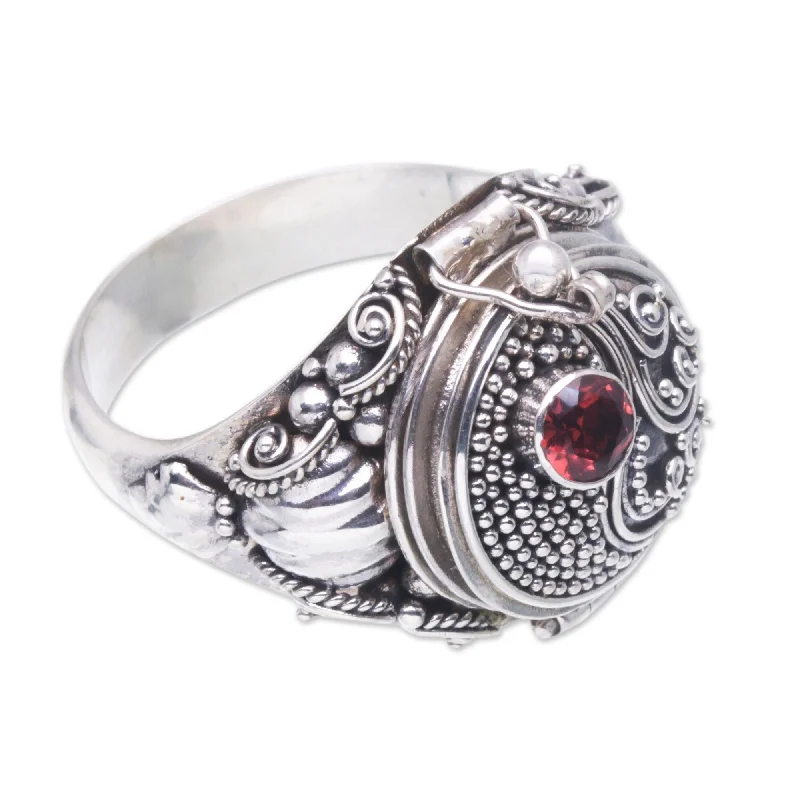 Tough rings designed for men with bold style -Novica Handmade Precious Swirl Garnet Locket Ring