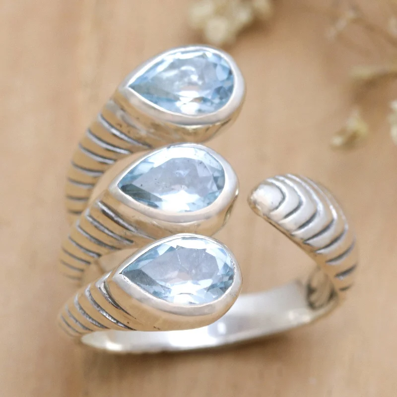 Rings featuring citrine for bright golden warmth -Novica Handmade Three Times Azure Blue Topaz Wrap Ring