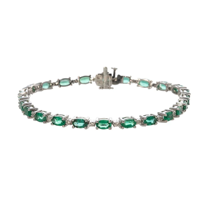 Knotted bracelets and bangles with twisted stone flair -Oval Emerald & Diamond 18K White Gold Tennis Bracelet