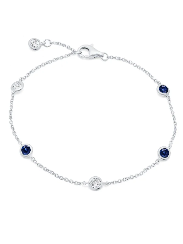 Slim bracelets and bangles for stackable wrist looks -Bezel Set Clear and Sapphire Bracelet Finished in Pure Platinum